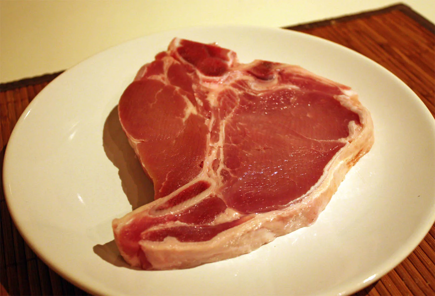 Originalfoto von Norman: rohes T-Bone-Steak